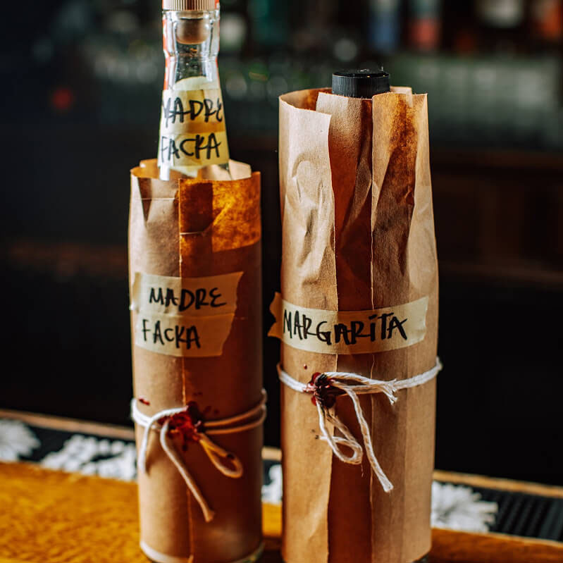 Bottles of cocktail mix and ingredients.